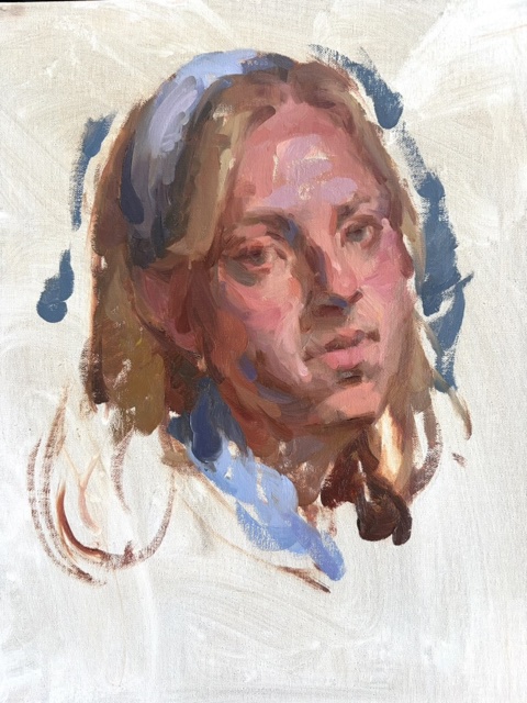 Girl wearing a blue headband against a pale background